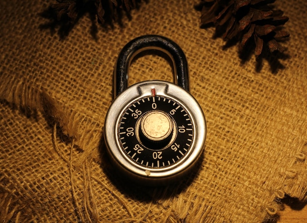vintage metal steel lock padlock on dark background theme