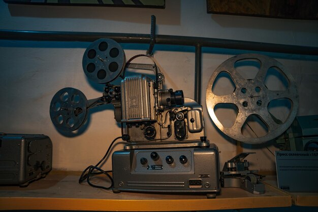 Photo vintage movie camera with film charged on reels