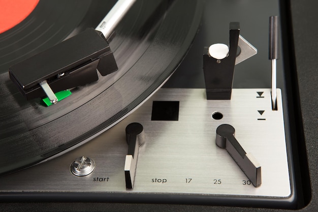 Vintage music player turntable with lp record