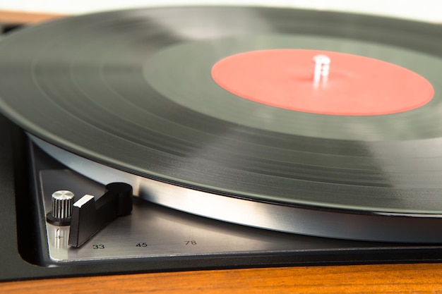 Vintage music player turntable with lp record