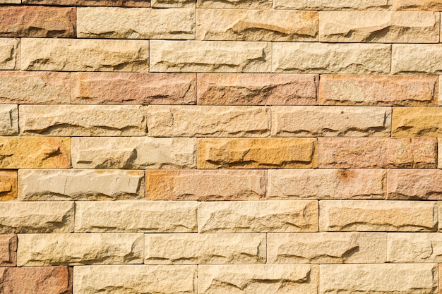 Vintage old brown brick wall and block for background texture 