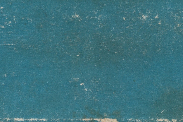 Vintage and old looking paper background with a damaged grunge texture