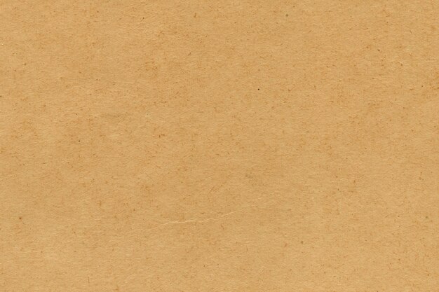 Vintage and old looking paper background with a damaged grunge texture