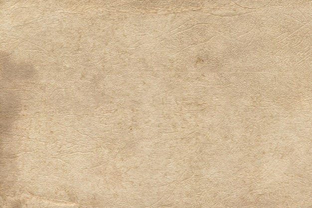 Vintage and old looking paper background with a grunge texture