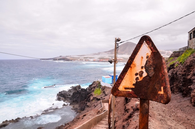 Vintage Old Rusty Road Sign Consumed by the Time