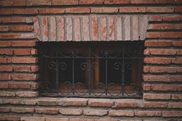 Vintage old window in a brick building