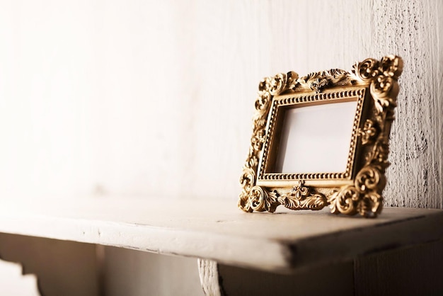 Vintage picture frame on shelf