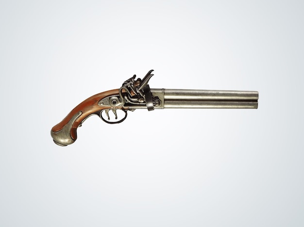 Vintage pirate flintlock pistol on a white background.