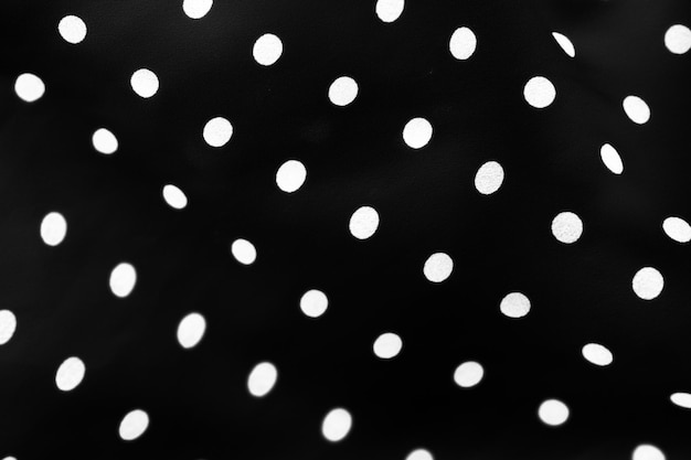 Foto vintage polka dot tessuto di sfondo texture punti bianchi su tessuto di lusso nero design pattern