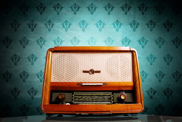 Vintage radio on blue background