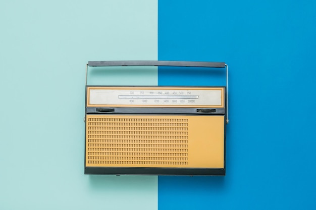 Vintage radio on a blue and light blue background Vintage technique