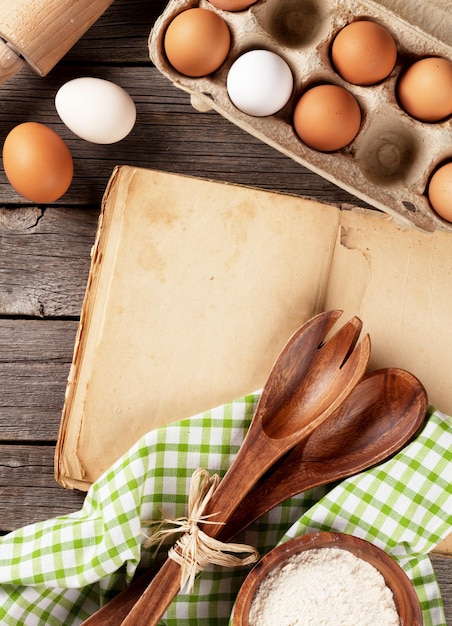 Vintage recipe book utensils and ingredients