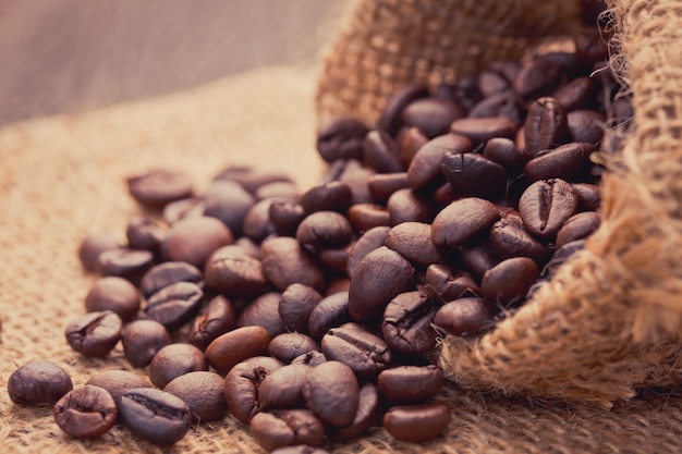 vintage roasted coffee bean in sackcloth close up.