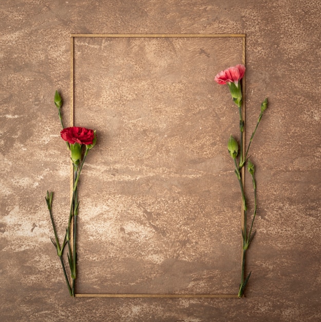 Foto vintage sepia frame met kleine anjerbloemen