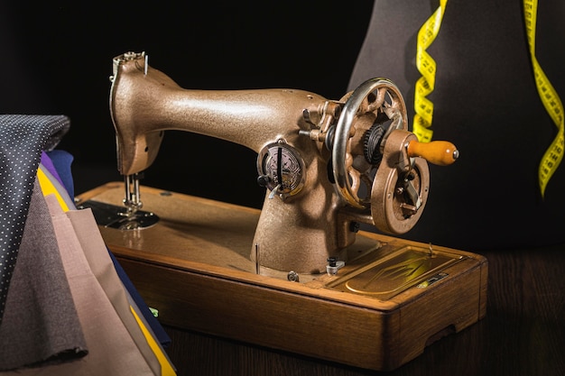 Vintage sewing machine with dress form