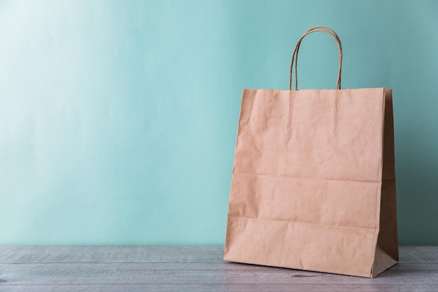 Vintage shopping bag in blue background