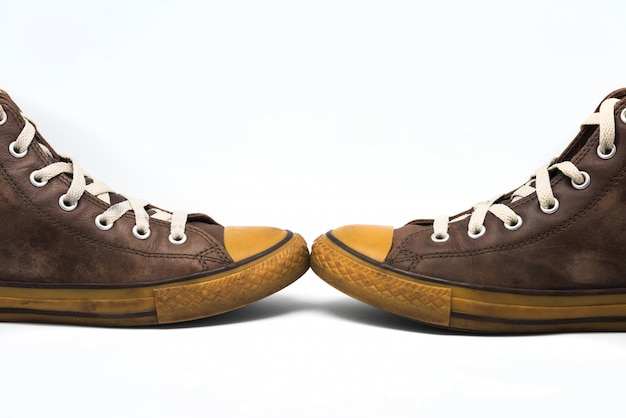 Vintage sneakers on white background