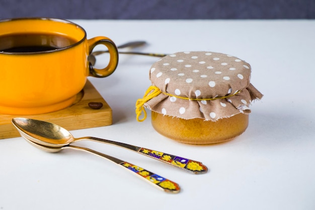 Photo vintage spoons silverware and black coffee cup