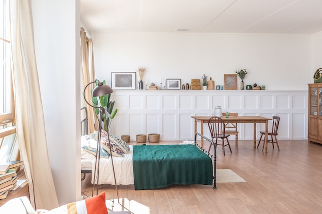 Vintage studio apartment interior in light colors in old style