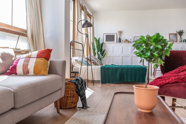 Vintage studio apartment interior in light colors in old style