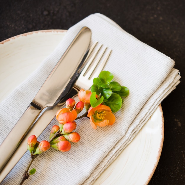 Vintage table setting with delicate flowers