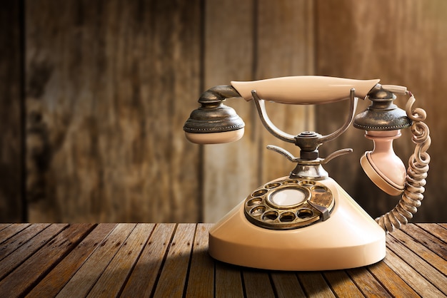 Photo vintage telephone on table