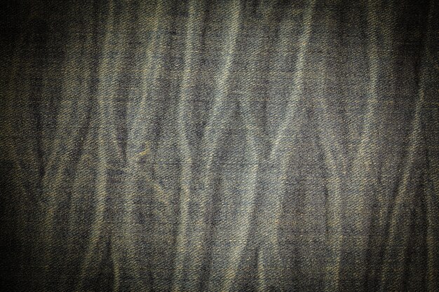 Foto texture vintage di jeans blu.