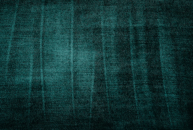 Vintage threadbare green fabric texture 