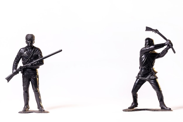 Vintage toy black soldiers isolated on white surface