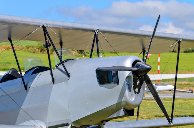 Vintage viplano single-engine plane at the aerodrome.