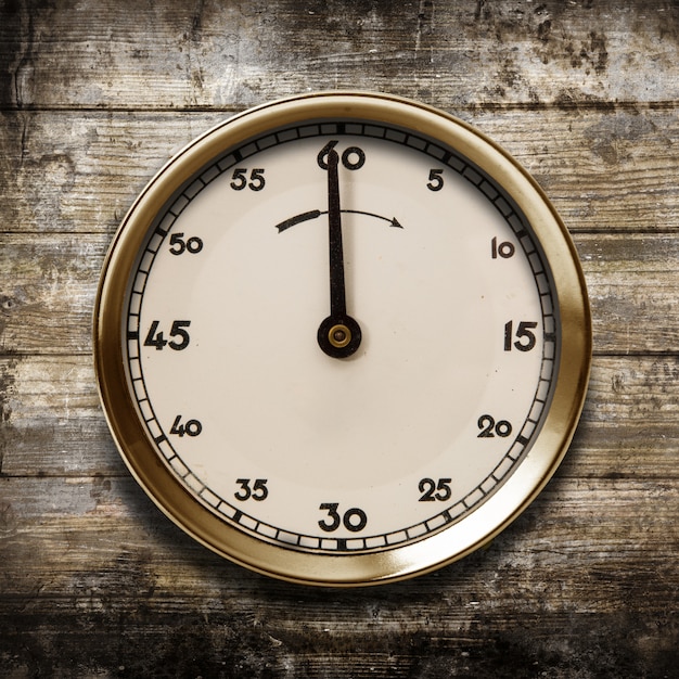 Vintage watch on a wooden background