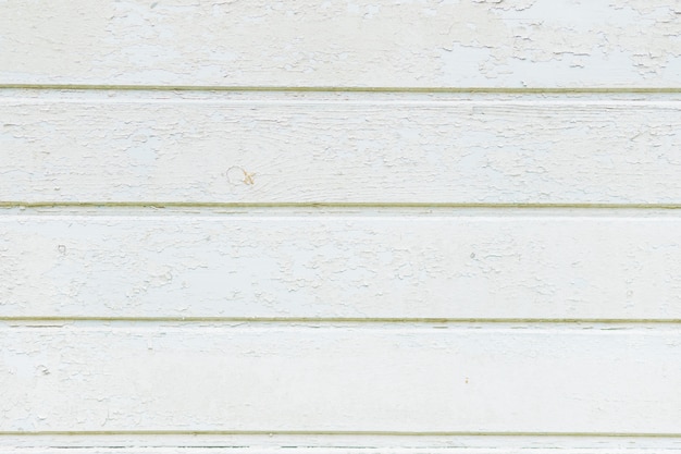 Vintage weathered shabby white painted wood texture as background. Rustic white pastel wooden plank texture.wooden wall, detailed background texture with natural patterns with cracked color