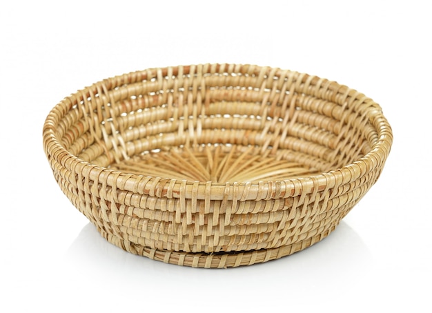 Photo vintage weave wicker basket on white wall