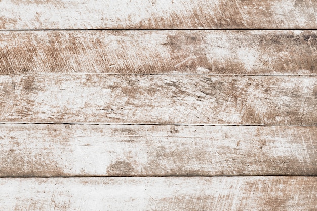 Foto fondo di legno bianco d'annata - vecchia plancia di legno stagionata dipinta nel colore bianco.