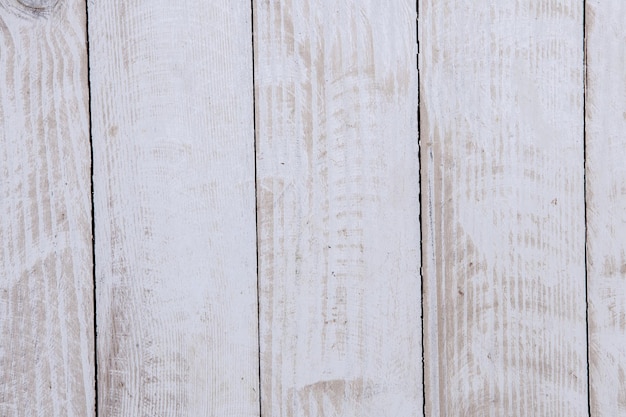 Vintage white wood background texture with knots and nail holes