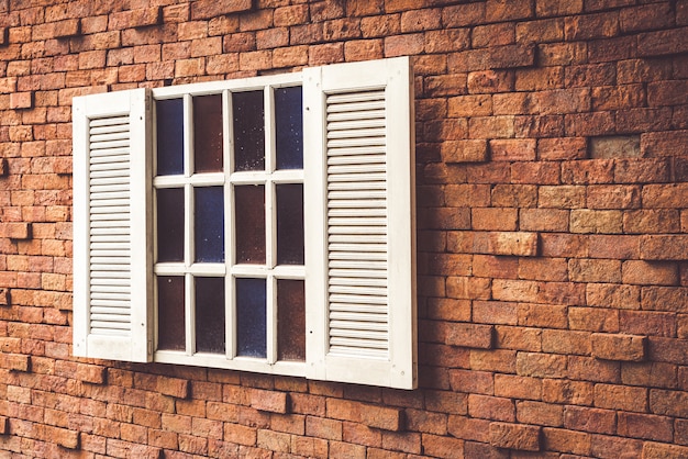 vintage window on brick wall