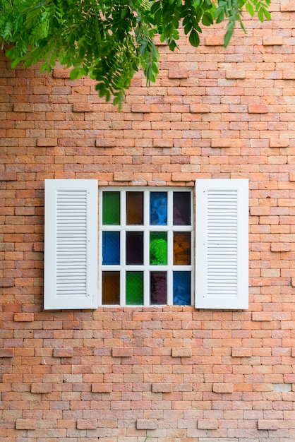 vintage window on brick wall