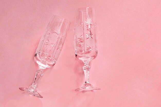 Vintage wineglasses on pink