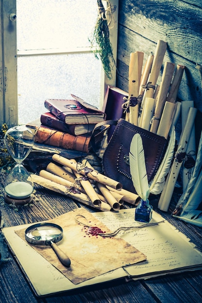 Vintage witch workshop with scrolls and ingredients