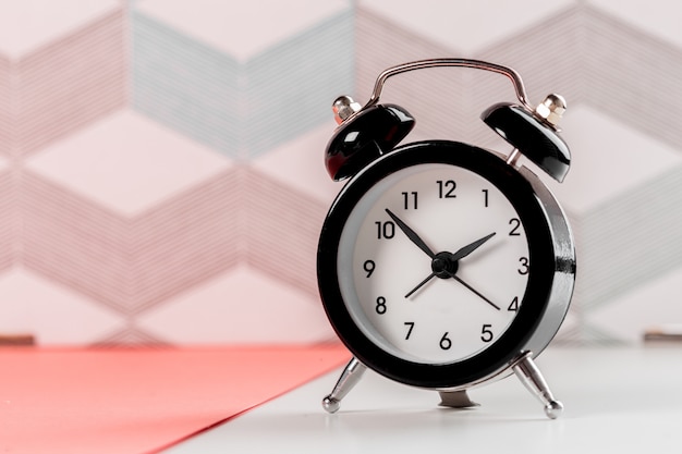 Vintage  with retro alarm clock on table