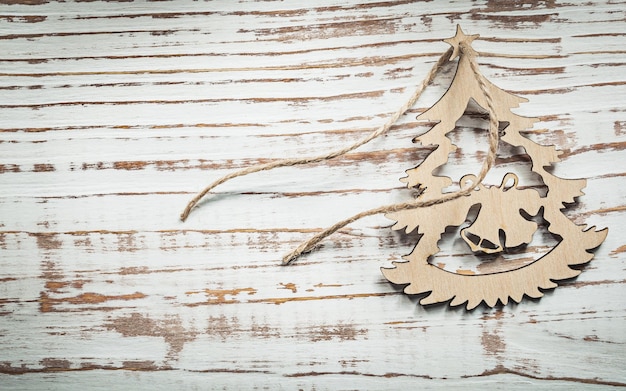 Vintage wood Christmas tree string on wooden board celebrations concept