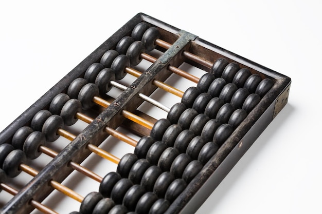 Vintage wooden abacus isolated on white