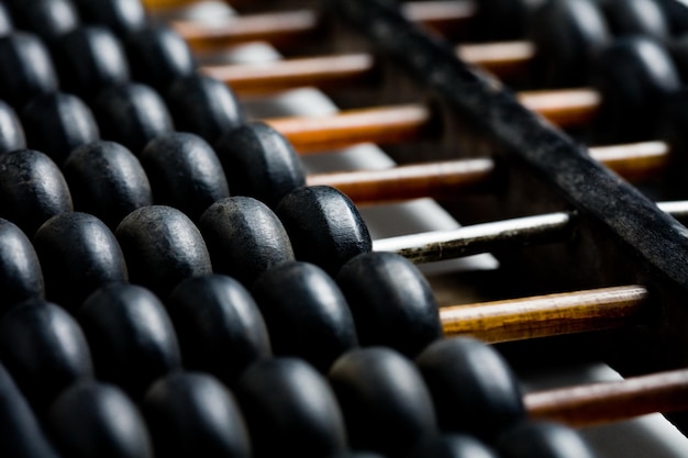 Vintage wooden abacus isolated on white