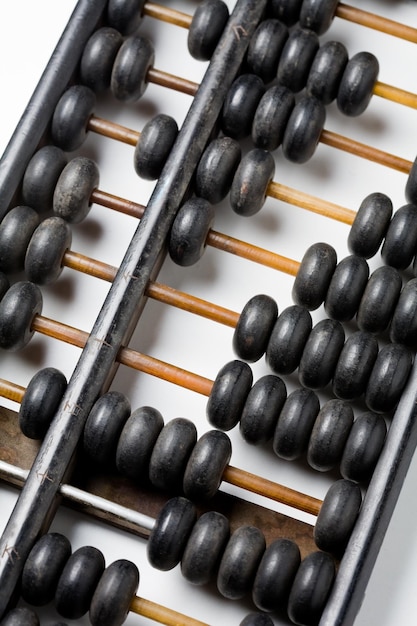 Vintage wooden abacus isolated on white