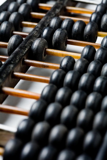 Vintage wooden abacus isolated on white