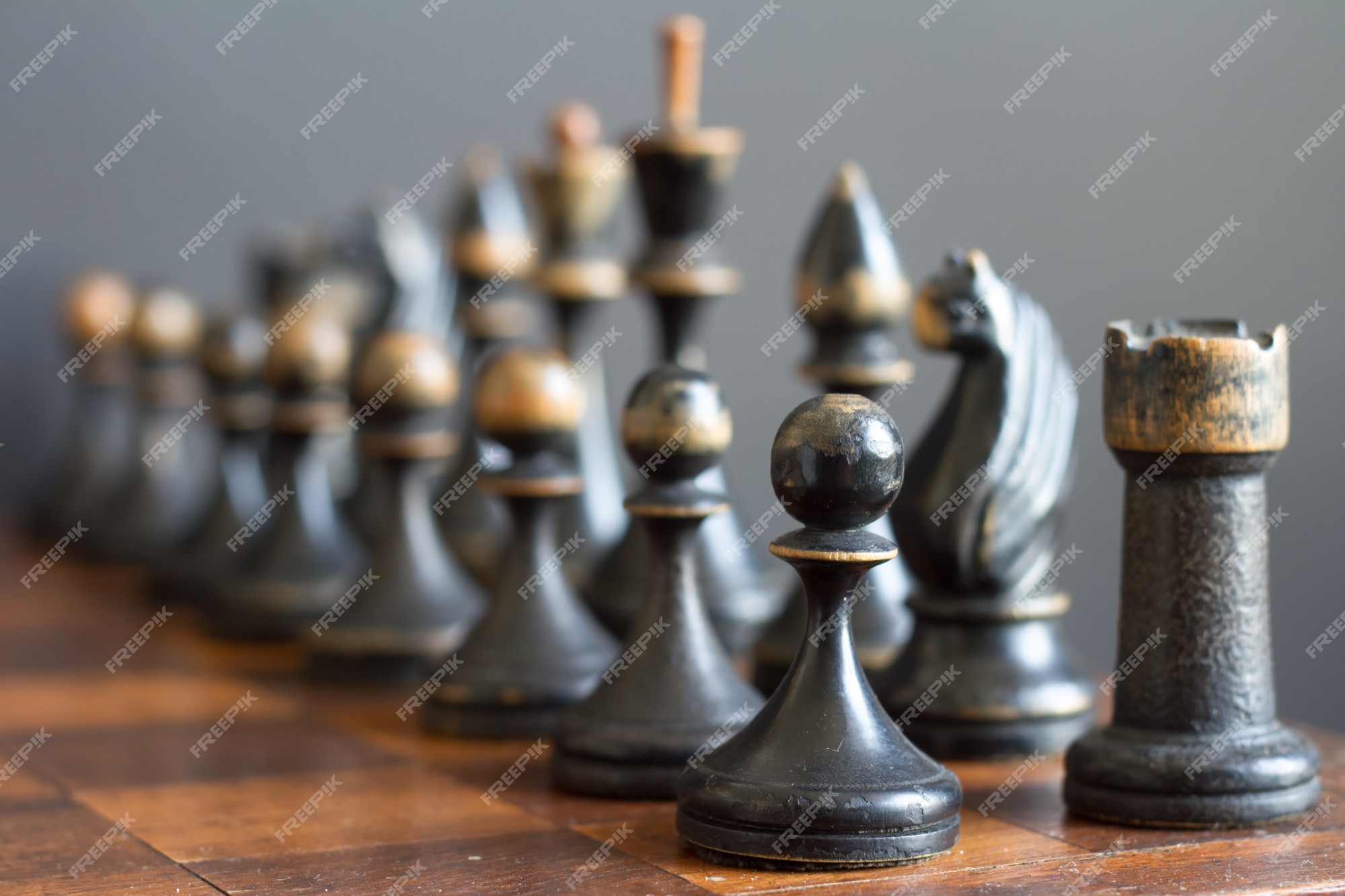 Ancient wooden chess pieces on an old chessboard Stock Photo - Alamy