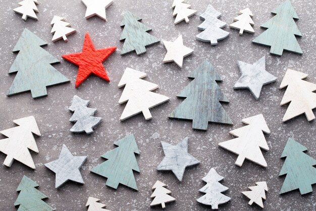 Vintage wooden christmas decor on the snow background.