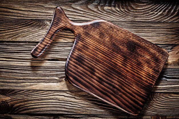 Photo vintage wooden cutting or serving board