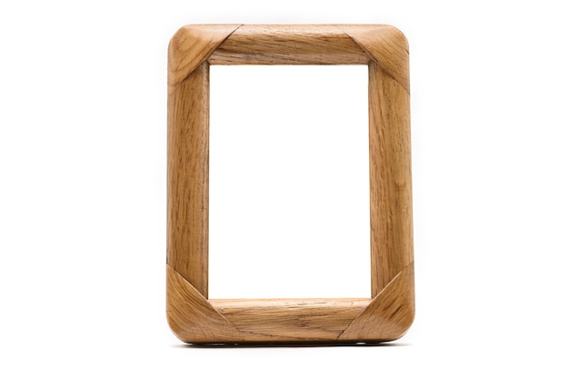 Vintage wooden photo frame on an isolated white background.
