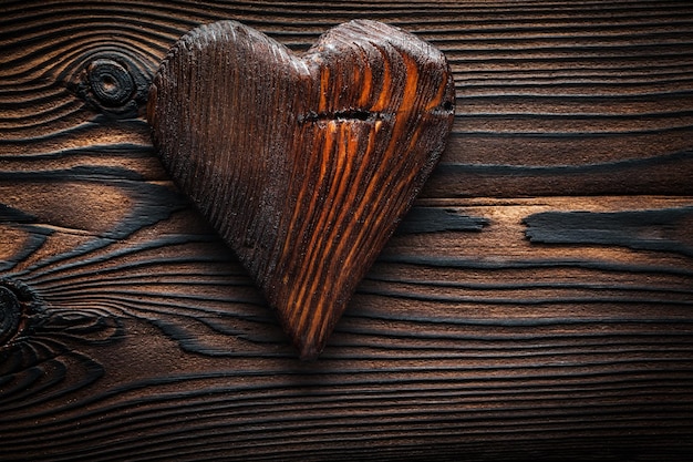 Vintage wooden toy valentine heart on wood